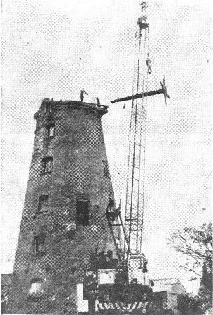 A 90 ft jib crane removing the sail shaft from the 65ft, old Pilling mill which is to be converted into a private house by a Bradford businessman.