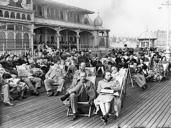Well wrapped up sunbathers on St.Annes pier in the 1950s.