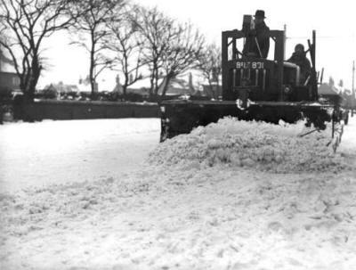Tractor clearing snow from Clifton Drive, St.Annes, 1940.