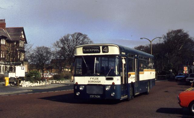 Photograph of a bus passing the St.Annes Hotel c1982.
